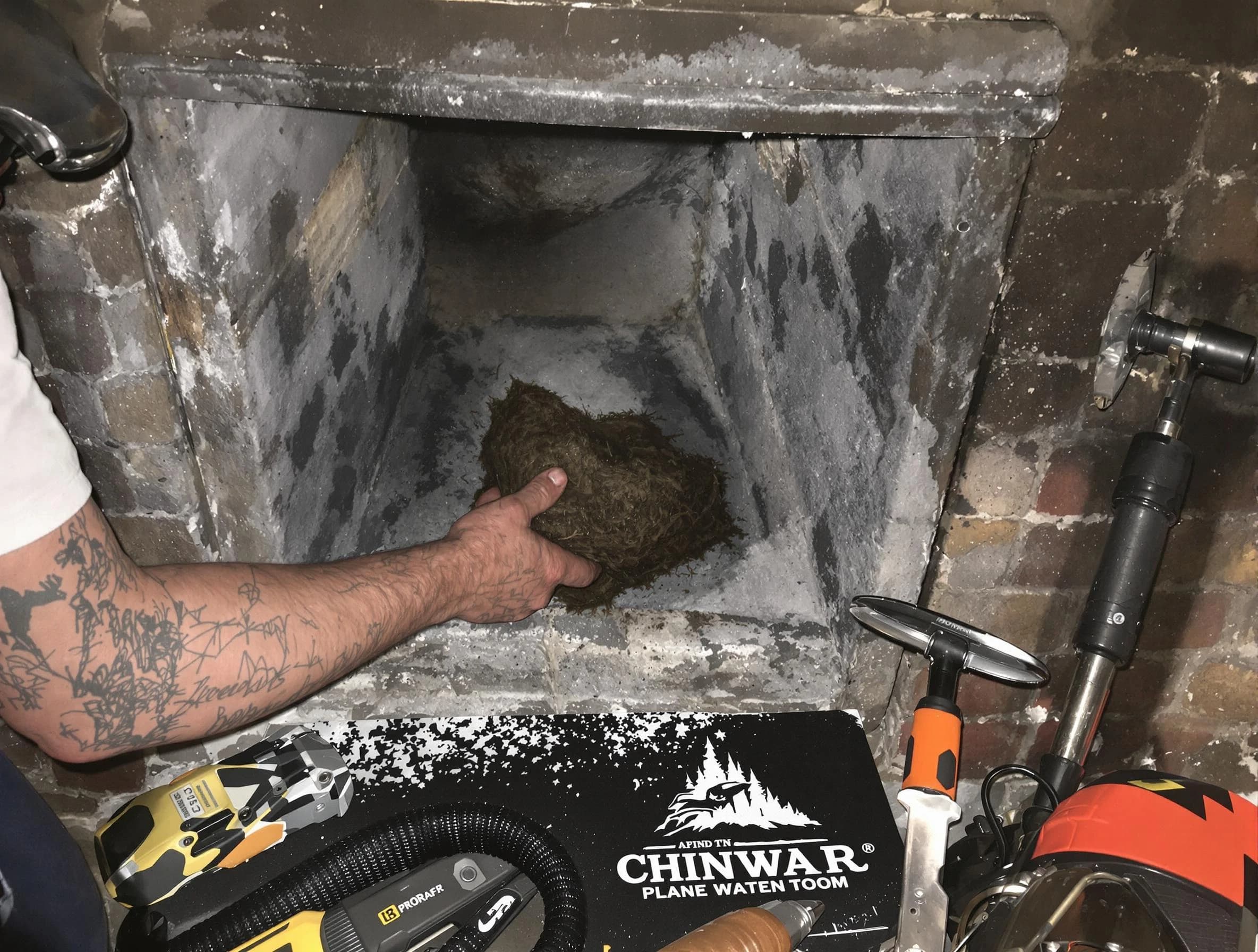 Chamberlayne Chimney Sweep safely removing debris and screening chimney in Chamberlayne, VA